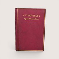 A burgundy cloth-bound hardcover book with a gilded rectangular border and gold typography for Afterwhiles by James Whitcomb Riley against a neutral background.