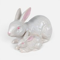 Vintage glossy white ceramic Rosenthal Netter bunny figurine with a smaller baby rabbit and pink painted accents.