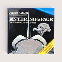 A vintage hardcover copy of Entering Space An Astronaut's Odyssey by Joseph P Allen featuring a space shuttle illustration.