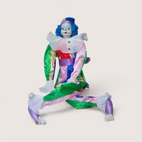 A vintage Bette Ball Victoria Ashlea Originals porcelain clown doll named Jody with blue hair and a colorful satin outfit.