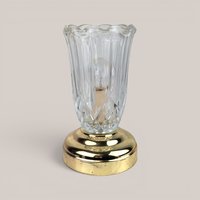 Vintage small clear glass and brass accent lamp with a fluted shade design and a visible interior bulb.