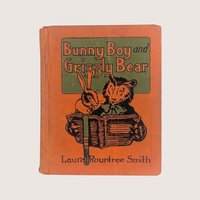 Antique orange hardcover edition of Bunny Boy and Grizzly Bear by Laura Rountree Smith with a rabbit and bear illustration.