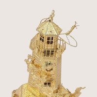 1998 Danbury Mint 23kt Gold Plated North Pole Lighthouse Ornament