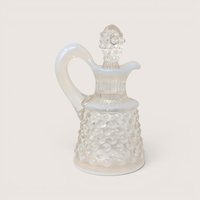 Vintage Fenton white opalescent hobnail glass cruet bottle with handle and a matching patterned glass stopper.