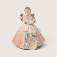 Vintage Josef Originals age 15 birthday girl porcelain figurine wearing a pink gown with gold angel wings.