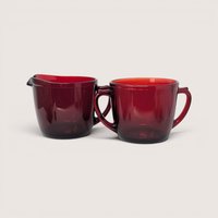 Vintage 1940s Anchor Hocking Royal Ruby red glass creamer and open sugar set with clean round silhouettes.