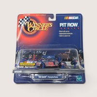 Vintage 1999 Winner's Circle Pit Row Series Dale Jarrett #88 Ford diecast pit scene sealed on original card packaging.