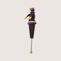 Vintage handmade felt monkey stick puppet with purple ruffled trim and gold sequins on a wooden rod.