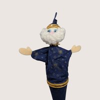 Vintage handmade felt wizard puppet in a blue star-print robe with a fluffy white beard and gold trim.