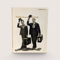 Vintage 1972 The Films of Laurel and Hardy softcover book by William K. Everson showing classic cover photo.