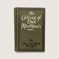 1909 hardcover book The Calling of Dan Matthews by Harold Bell Wright with olive green cloth cover.