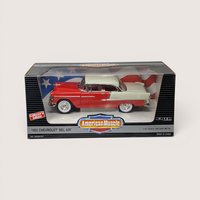 Vintage 1995 Ertl American Muscle red and white 1955 Chevrolet Bel Air die-cast vehicle in its original window box set against a plain linen background.