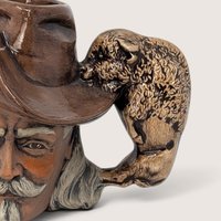 Vintage hand-painted ceramic character mug depicting Buffalo Bill Cody with a sculpted bison handle and "DAD" inscribed on the base.