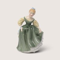 Vintage Royal Doulton Fair Maiden porcelain figurine depicting a woman in an olive green dress and blue hair bow.