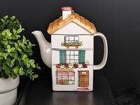 1994 Bake Shop Shaped Teapot, Rainbowman (Imperfect)