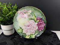 Reticulated Plate with Pink Roses on a Green Background