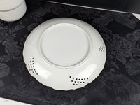 Reticulated Plate with Pink Roses on a Green Background