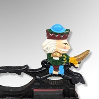 Vintage Cast Iron Nutcracker on a Wood Base