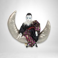 Harlequin Musical Doll on Moon