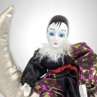 Harlequin Musical Doll on Moon