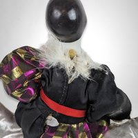 Harlequin Musical Doll on Moon