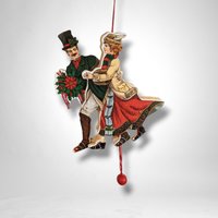 Vintage ROC Wood Ornament Couple with Pull String: Charming Decorative Collectible