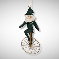 1992 Charlene Smith Signed Metal Ornament of Santa on a Unicycle