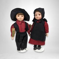 The Amish Porcelain Boy and Girl Dolls with Stands