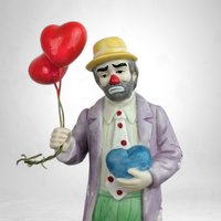 Vintage Flambro 7.5" Emmett Kelly Jr. Clown with Balloons Figurine: Timeless Collectible