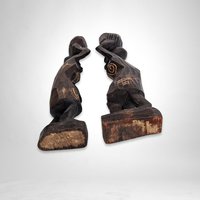 Pair of Vintage Hand-Carved African Wooden Sculptures: Exquisite Artistry and Cultural Beauty