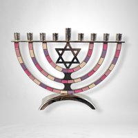 Illuminate Your Hanukkah with a Colorful Metal Menorah