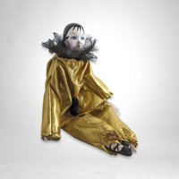 Porcelain Gold Glamour Harlequin Doll: A Touch of Elegance and Mystery