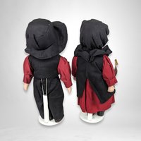 The Amish Porcelain Boy and Girl Dolls with Stands