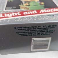 Charming 1989 Hallmark Tiny Tinker Light and Motion Ornament - Vintage Holiday Collectible