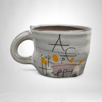 A Cup of Happy: Handmade Pottery Mug for Joyful Sips