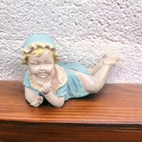 Vintage Ceramic Blue Laying Down Baby Figurine