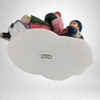 Charming Vintage O'Well Man and Woman Ice Skating Village Figurine - Timeless Winter Elegance for Your Décor!