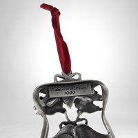 Avon 1999 Pewter Season of Peace Christmas Bells Ornament - Timeless Elegance for Your Holiday Décor!