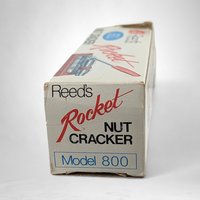Reed's Rocket Nutcracker: Timeless Elegance Meets Effortless Nut Cracking in Vintage Style
