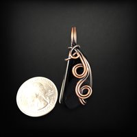 Artisan Elegance: Handmade Copper Wire Wrapped Black Onyx Pendant