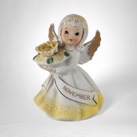 Vintage Ceramic Birthday Month November Angel Figurine - Charming Collectible