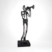 Swingin' Statue: Bronze Horn Player Blows Away in Vintage Charm
