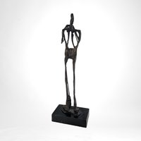 Swingin' Statue: Bronze Horn Player Blows Away in Vintage Charm