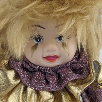 Vintage White and Gold 8" Porcelain Baby Jester Doll
