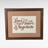 Vintage Framed Completed Cross Stitch: 'Love, Honor, and Negotiate'. Creative Circle.