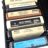 Vintage 1976 8-Track Tape Case with 12 Tapes: Faux Wood Grain Music Storage