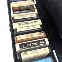 Vintage 1976 8-Track Tape Case with 12 Tapes: Faux Wood Grain Music Storage