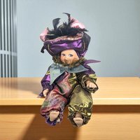 Vintage Harlequin Jester Porcelain Doll: Collectible Clown Decor