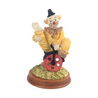 Vintage Waving Clown Figurine: Bicycle Rider