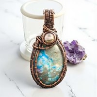 Handmade Copper Wire Wrapped Pendant: Blue Natural Stone with Clear Accent